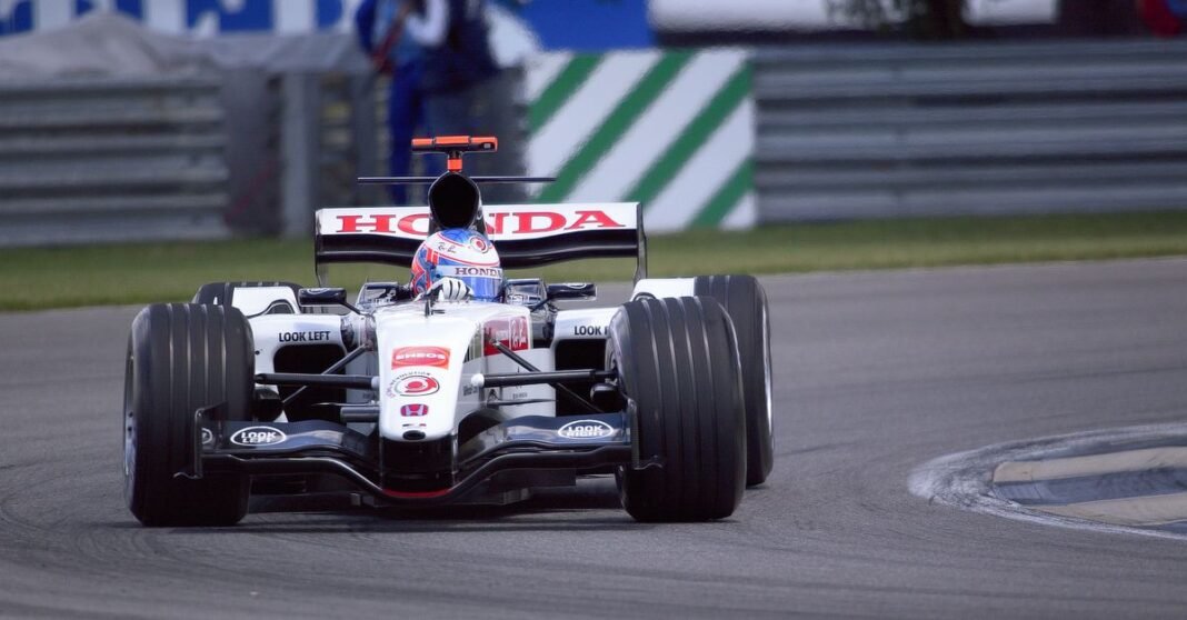 Honda Formula 1 racecar on track during Indianapolis Motor Speedway event.
