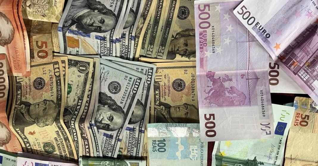 Assorted international banknotes showcasing different currencies. Ideal for finance-related themes.
