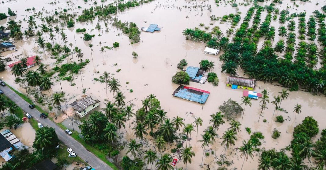 Drone shot capturing extensive flooding in Kijal, Malaysia village.